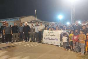 پیاده‌روی خانوادگی به مناسبت هفته سلامت در ورزشگاه آزادی شهرستان قیروکارزین